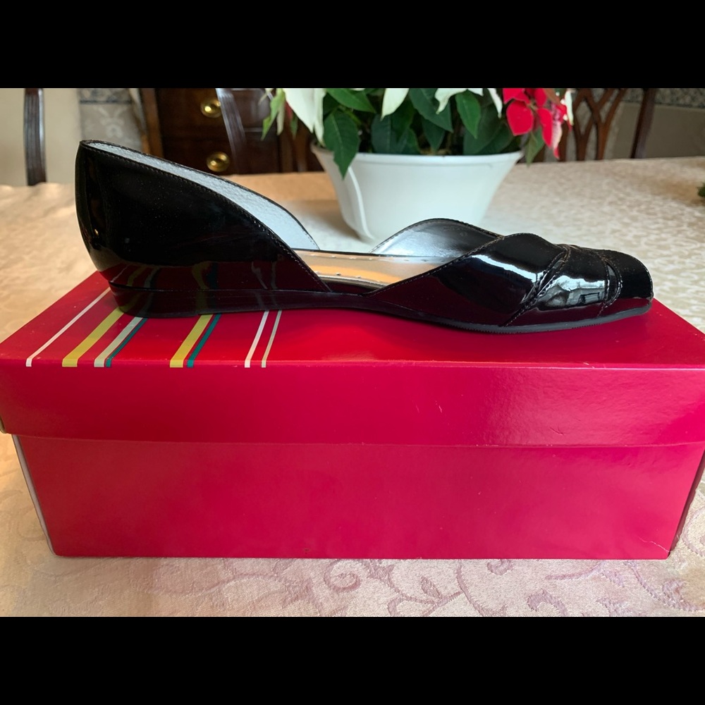 BCBGirls Black Patent peep toed flats.